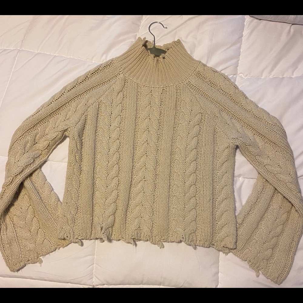 Ribbed Off-White Turtleneck.